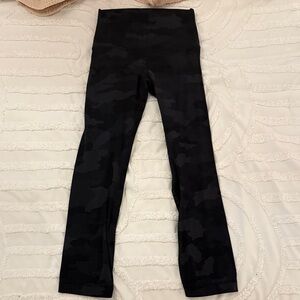 Women’s size 4  23” camo leggings